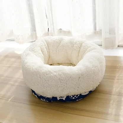 Cozy plush cat bed and dog sleeping cave for small pets, featuring a soft, fluffy interior and stylish blue outer design.